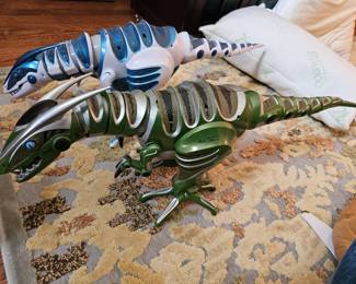 pair of Roboraptor robot toys
