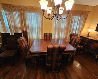 Antique Buffet cabinet, matching Dining table with 4/leaves, 4-leather/wood side chairs, 5-upholstered dining side chairs.