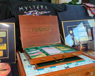 Deluxe Monopoly Set by the Danbury Mint Company made in 2006 - the houses and hotel pieces are magnetic to the board. Each player (x4) has their own pull out drawer. 