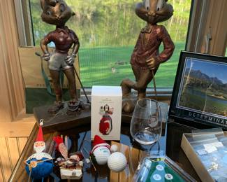 2 Austin bronze Sculptures featuring Looney Tunes characters dressed in their golf attire - Bugs Bunny and Lola (Babs)