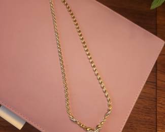 V Shaped 14k and diamond necklace 
Gold link necklace is substantial and heavy