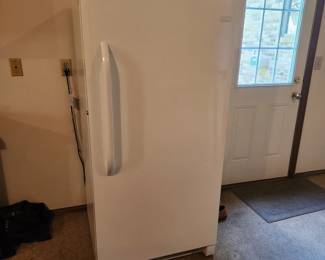 Upright Frigidaire Freezer, clean and new condition