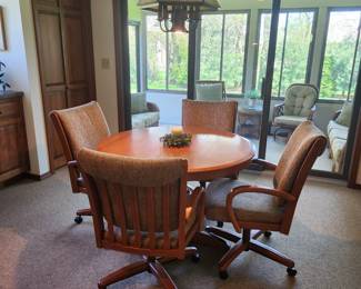 Chromcast kitchen set. These are bulletproof and comfortable! Very high-end set with leaf for the table. 