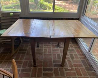 $195- Pub table located on back porch, needs refinishing