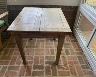 $195 Pub table located on back porch, needs refinishing
