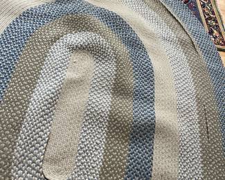 $150 Hooked oval rug as is -some areas need to be re-sawn