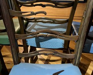 $240 six wooden chairs with assorted colored cushions some damage as is