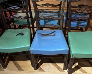 240 6 wooden chairs with assorted colored cushions some damage as is