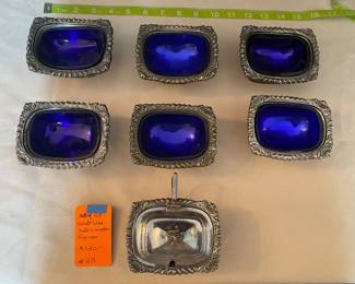 #45 - $120 - 7 pieces set s.p salt dishes with blue cobalt liners - English. 