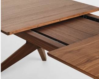$7000 USD     Design Within Reach Case Cross Extension Walnut Dining Table DG233-01      Finished with a solid-wood chamfered edge for comfort and durability, the tabletop has a locking steel mechanism that easily opens to accommodate the table’s additional leaves. Cross can seat up to 12 people depending on chair size. Made in Lithuania.
Dimensions:   78⅜"-119" W x 39⅜" D x 29⅝" H
Condition: In excellent very lightly used condition. 2 yrs old. 
Location: Local pick up Wilsonville, OR.  Shipping suggestions available upon request.       https://goodbyhello.com/products/dwr-case-cross-extension-walnut-dining-table-dg233-01?_pos=10&_sid=3b2c7fbf0&_ss=r