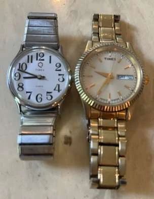 Two Timex Watches One Gold Tone And One Silver Tone 