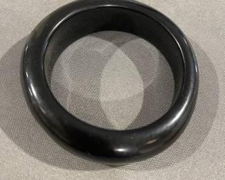bangle (uncertain if bakelite or a natural material)