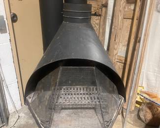 Early 1960s Firehood fireplace with screen and tall chimney
