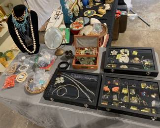 Variety of jewelry from Navajo pearls to Midcentury costume pieces.