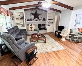 Lovely home with a great sense of style… lazy Boy recliner & full couch with electric reclining sides! So comfy!!!