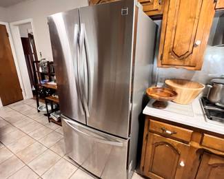 Real nice stainless steel fridge! Looks great and works perfectly except the client said the  ice maker seems to need some attention (she said they never used it anyway) 