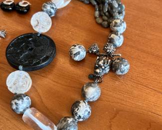 This amazing matching carved necklace & earring set with sterling silver dragon head adornments! What a statement piece.