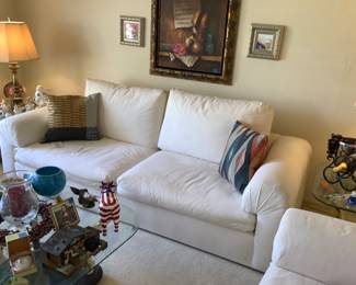 Beautiful contemporary sofa, loveseat, chair, and ottoman in good condition.