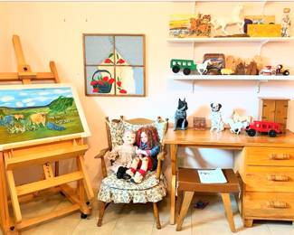 Large easel, charming longhorn painting, early American chair and vintage dolls, Mid Century Ranch Mode desk and leather stool made by Harmony House and distributed in the 1950's by Sears and Roebucks