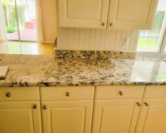 kitchen cabinets, granite countertop
