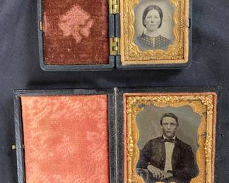 Antique  double case Daguerrotypes/tintypes, one thermoplastic case, one faux leather embossed case