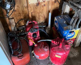Several vintage gas cans