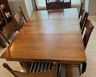 Antique Oak table with 5 leaves and 6 chairs