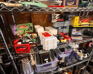 Diecast cars, hot curlers, mugs, coffee cups