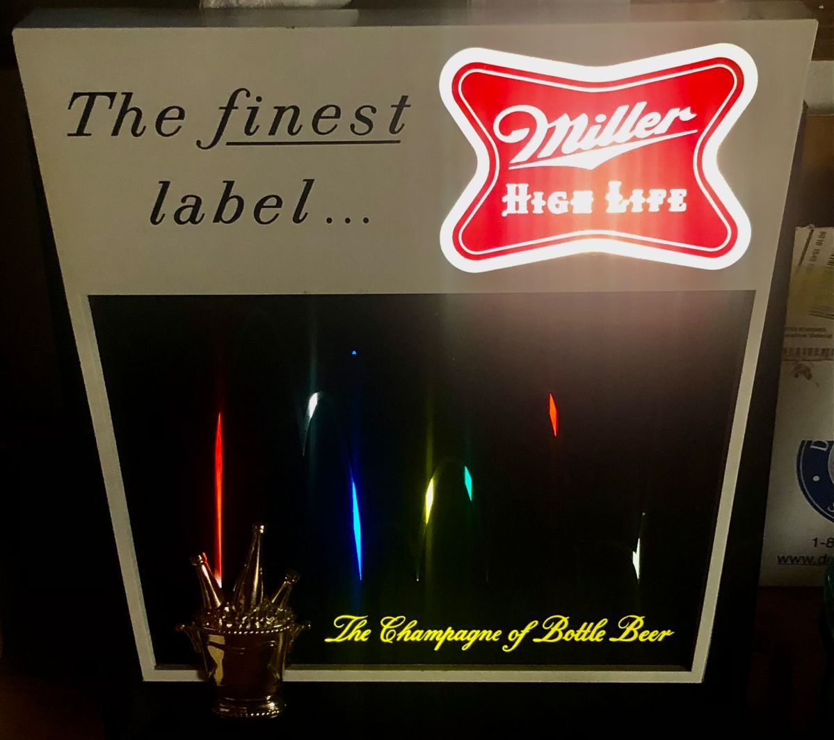 One of several vintage lighted beer signs