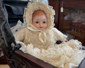 Love this beautiful bisque doll with glass eyes and soft body. Lovely clothes.