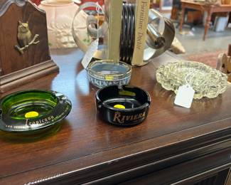 Collection of Ash Trays. Notice Mid Century Modern Book Ends