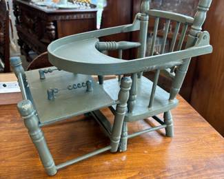 This fold out chair becomes doll high chair