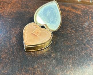 Miniature heart compact.