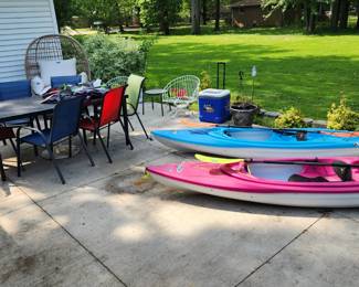 Patio Table and Chairs, Life Vests, Patio Egg Chair, Pelican Kayak (Blue), Pelican Kayak (Pink)