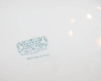 12 Wedgwood dinner plates.