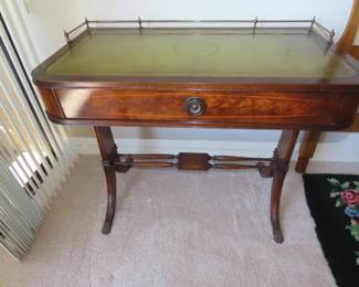 Leather inlaid writing desk.