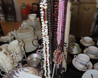 Necklaces and bone china.