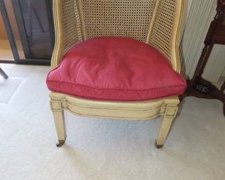 Caneback side chair.