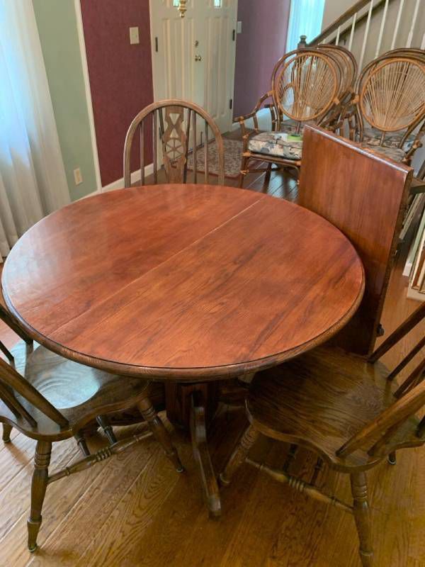 Round oak table 41 inches with 21 inch leaf and 3 chairs
