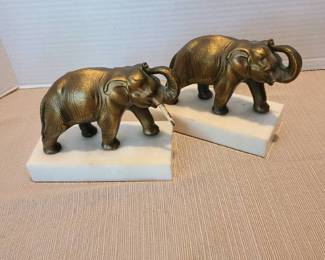 Pair of metal elephant bookends 4.5 inches tall, missing 3 out of 4 tusks.