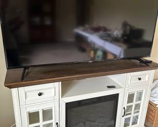 Electric fireplace and Element ROKU television