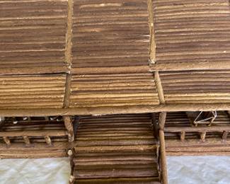 Hand crafted cabin created from coffee-dyed, rolled paper; purchased from Prison Creative Arts Project.