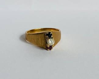 14 karat gold ring with red and blue stones and diamond
