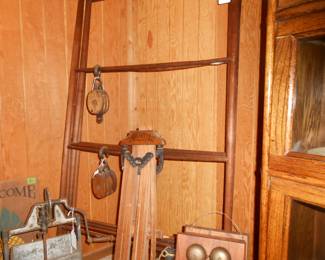 Two drying racks one is a wall mount also two small pulleys.