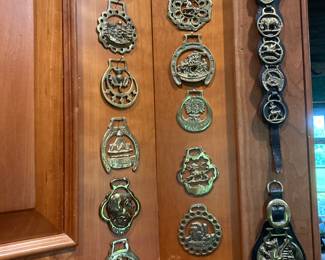 Collection of brass horse bridle medallions
