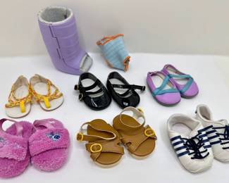 6 Pairs American Girl Doll Shoes, Cast & Foot Brace
Lot #: 19