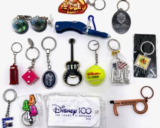 16 Souvenir Keychains Including Bottle Opener, Mini Snow Globes & More
Lot #: 154