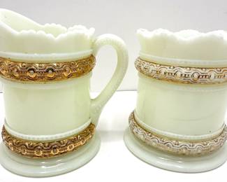 Antique 1901 Heisey Milk Glass Mug & Creamer Set With Gold Accents
Lot #: 83