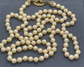 Approximate 42 Inch Strand of 7 MM to 7.2 MM Cultured Pearls Featuring a 14 Kt Yellow Gold, Diamond and Sapphire Clasp.
