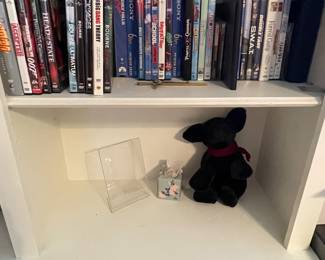 Bookshelf full of Books on Various Topics